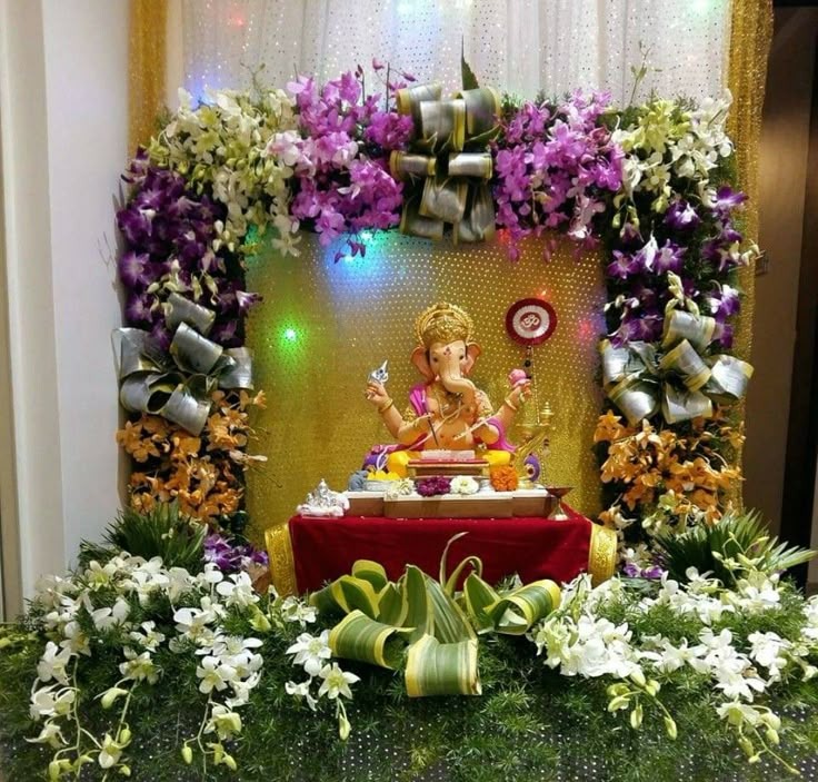 SF-38 — Ganesha mantap with purple orchids and golden sparkle backdrop