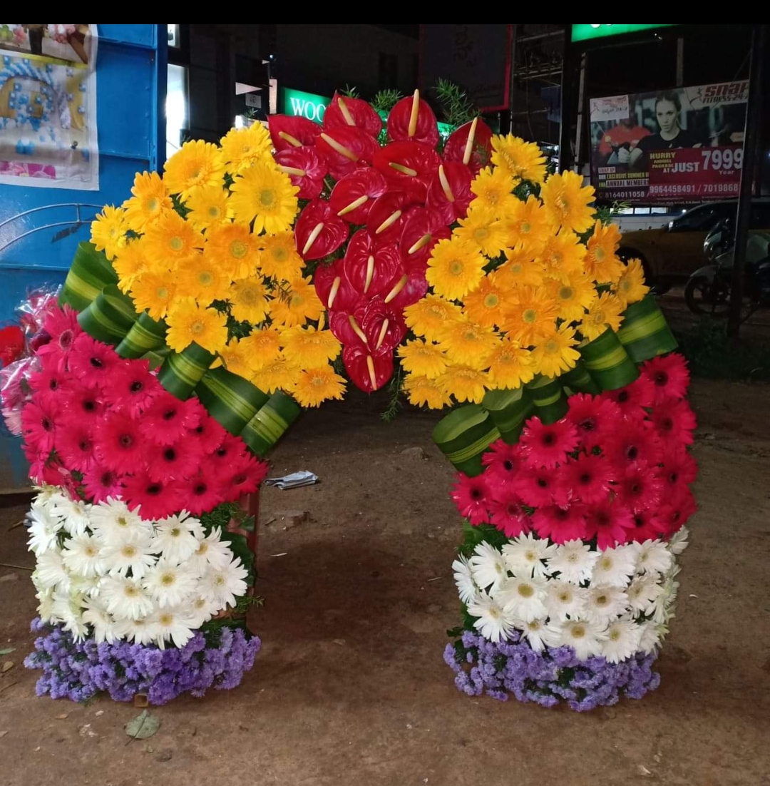 Colourful gerbera and anthurium entrance arch