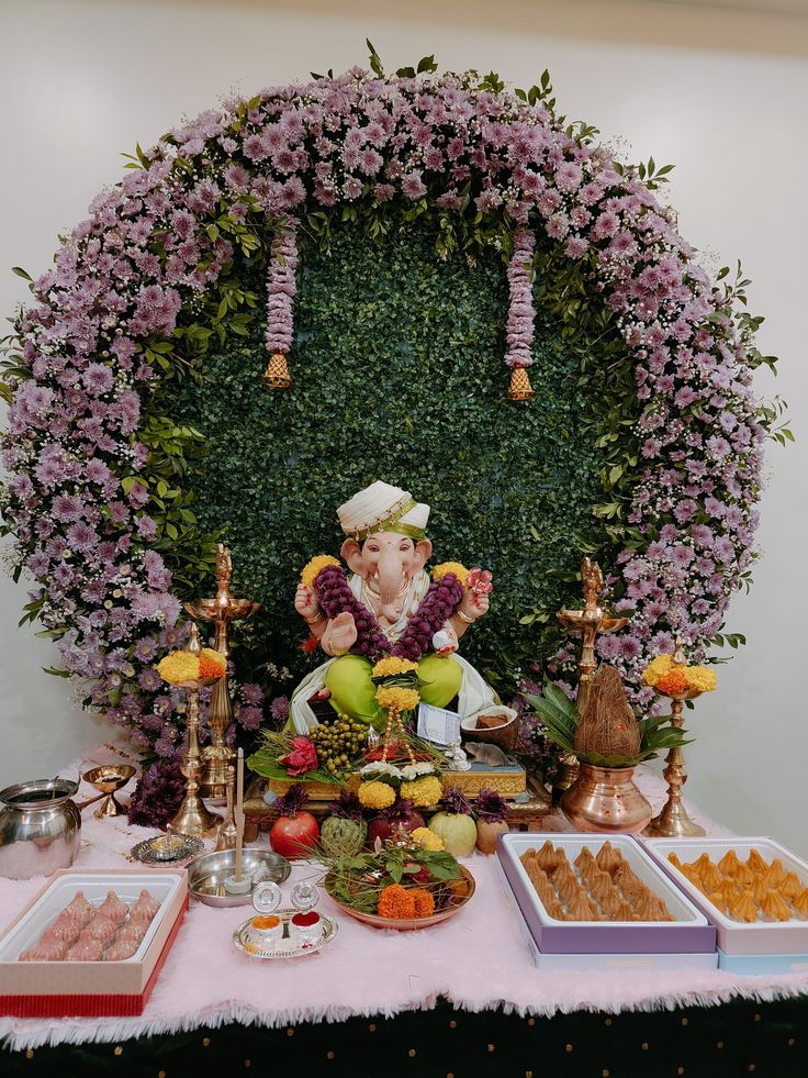 SF-48 — Ganesha decoration with lavender chrysanthemum circular arch on green leaf wall
