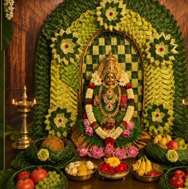 SF-31 — Varamahalakshmi decoration with green leaf woven arch, lotus flowers and brass lamps