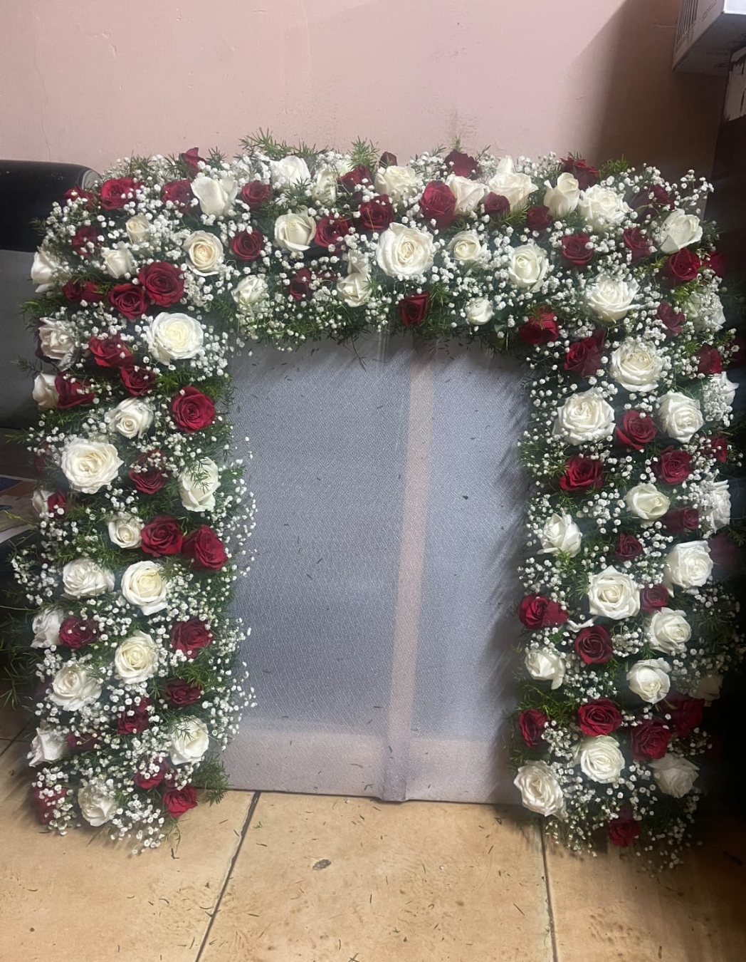 Red and white rose arch decoration