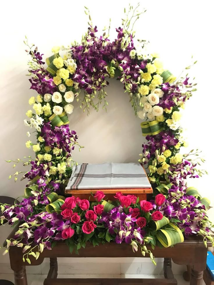 SF-58 — Purple orchid and yellow carnation circular flower arch