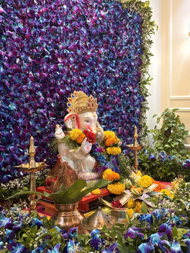 SF-05 — Ganesha decoration with blue orchid flower wall and brass lamps