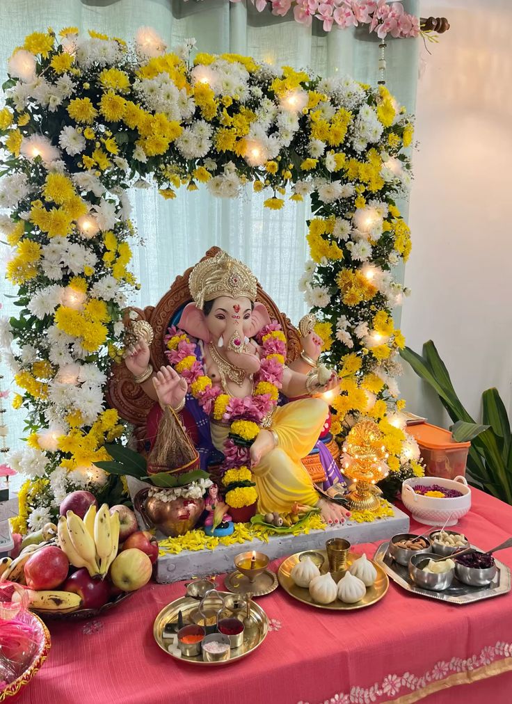 SF-49 — Ganesha mantap with yellow and white flower arch and fairy lights