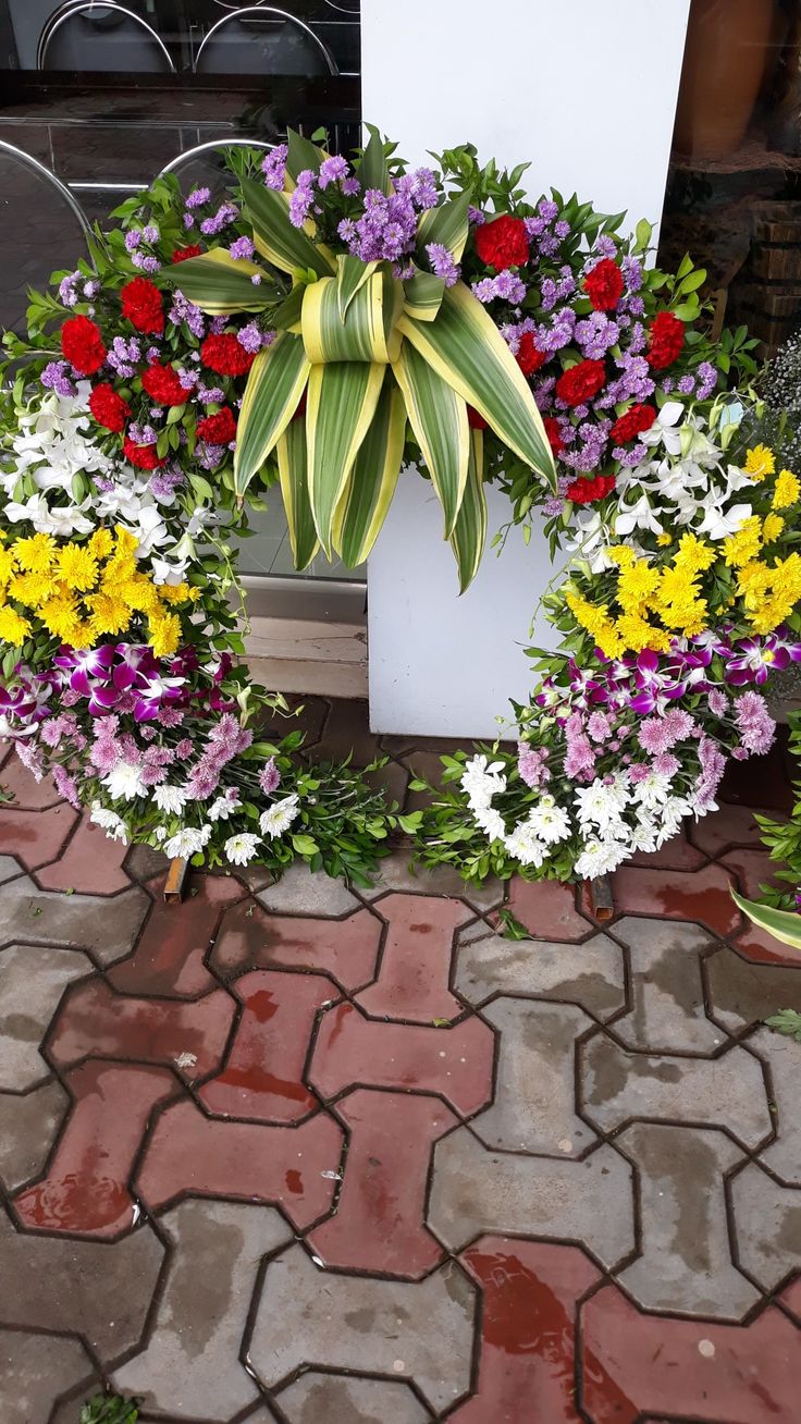 SF-59 — Colourful mixed flower ring arches ready for delivery
